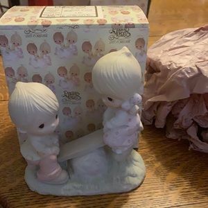 Precious Moments figurine ‘Love lifted me.’